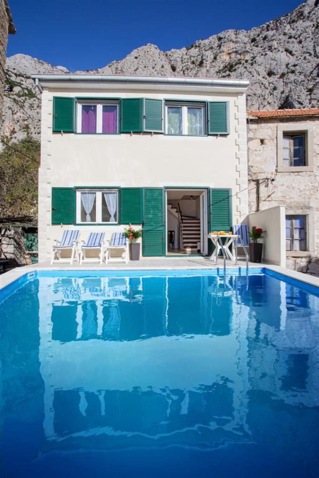 Maja mit Pool und herrlichem Meerblick-Dedans