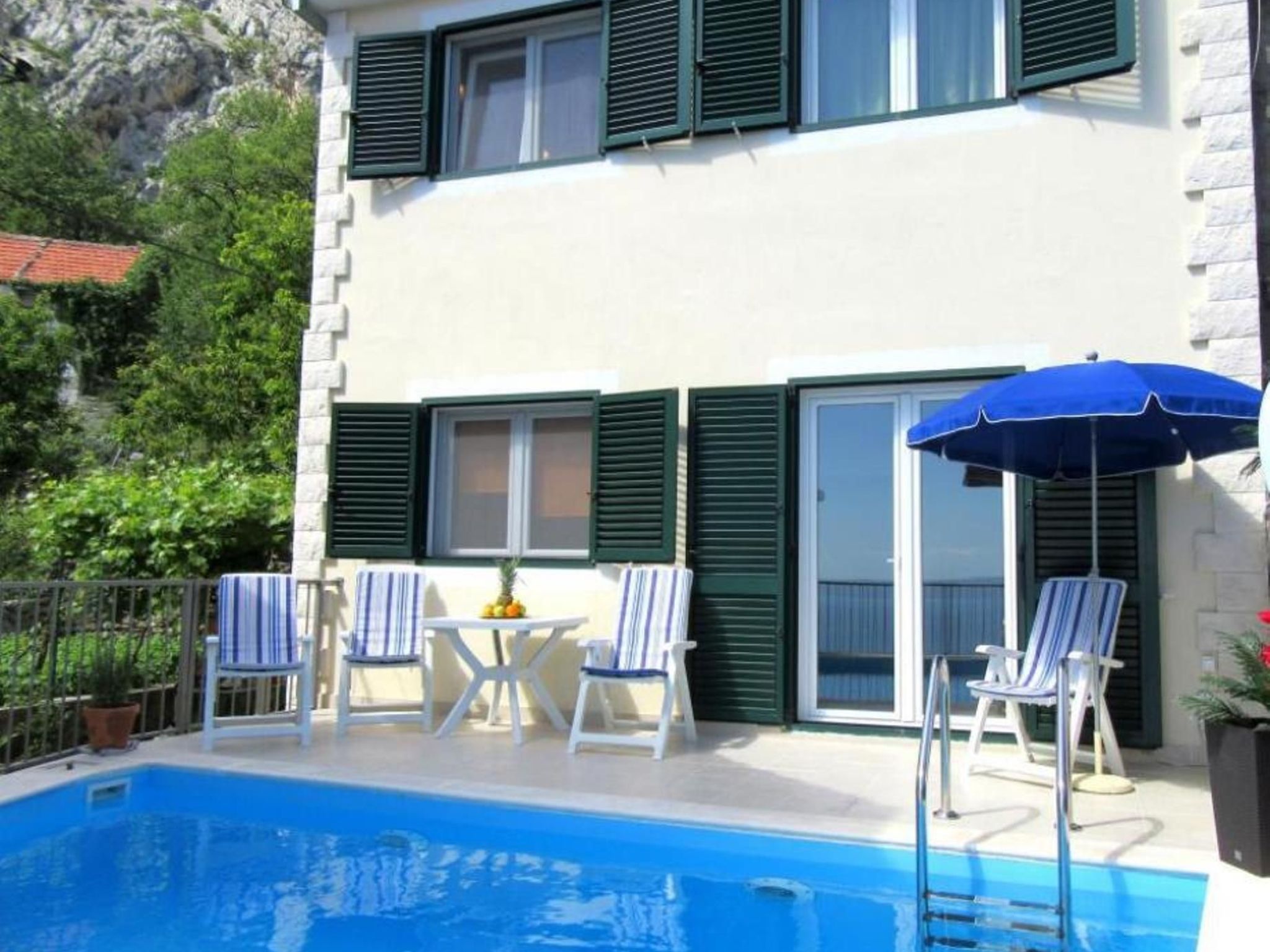 Maja mit Pool und herrlichem Meerblick-Dedans