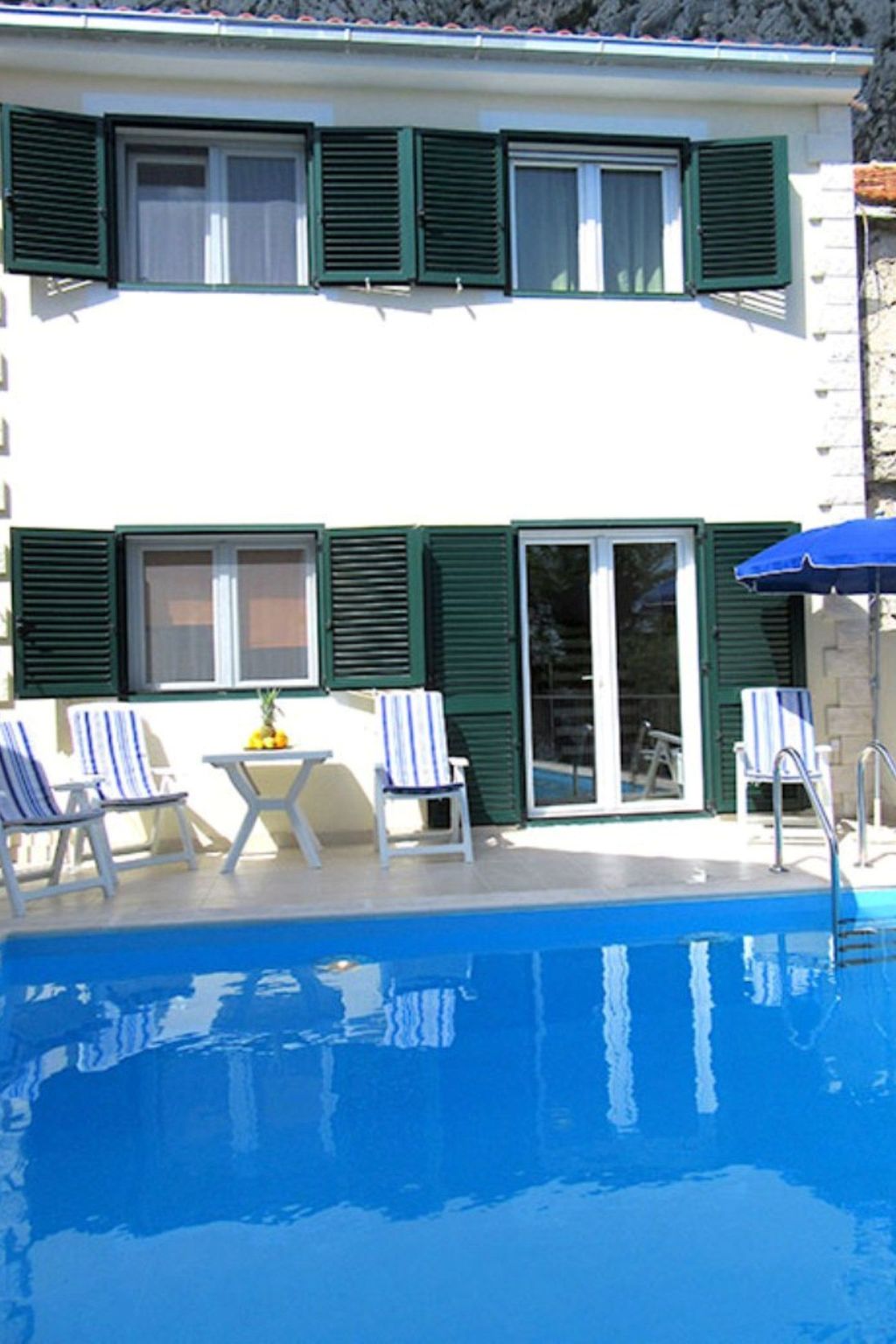 Maja mit Pool und herrlichem Meerblick-Dedans