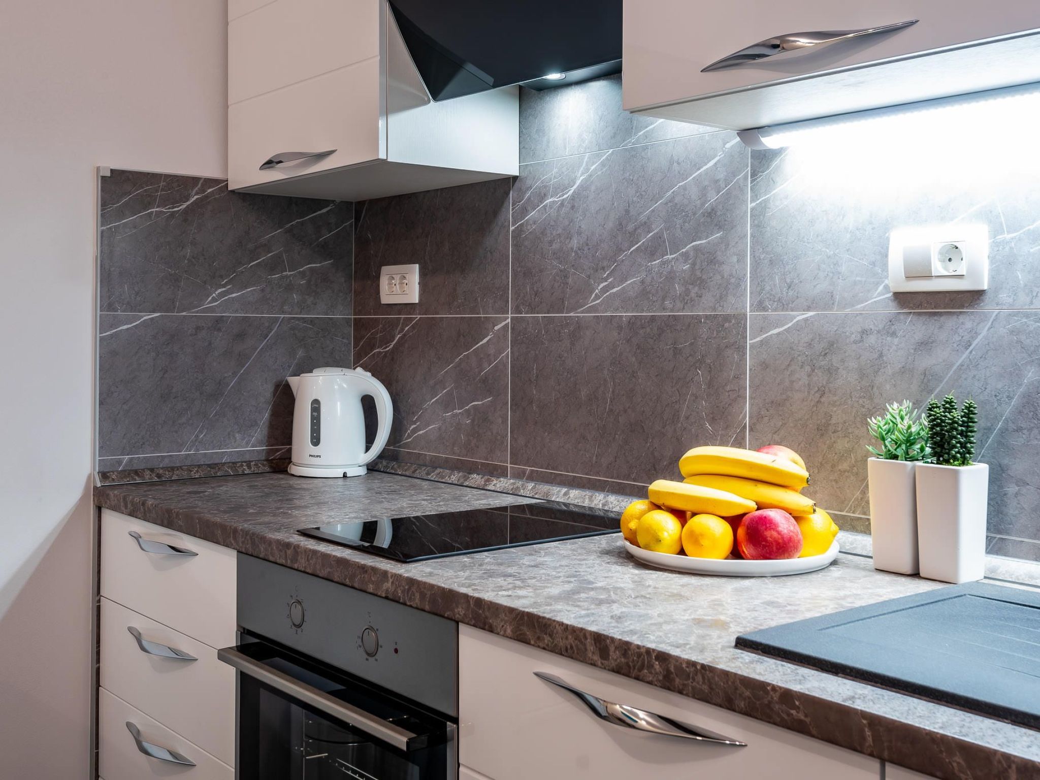 Mit privater Terrasse-Drinnen