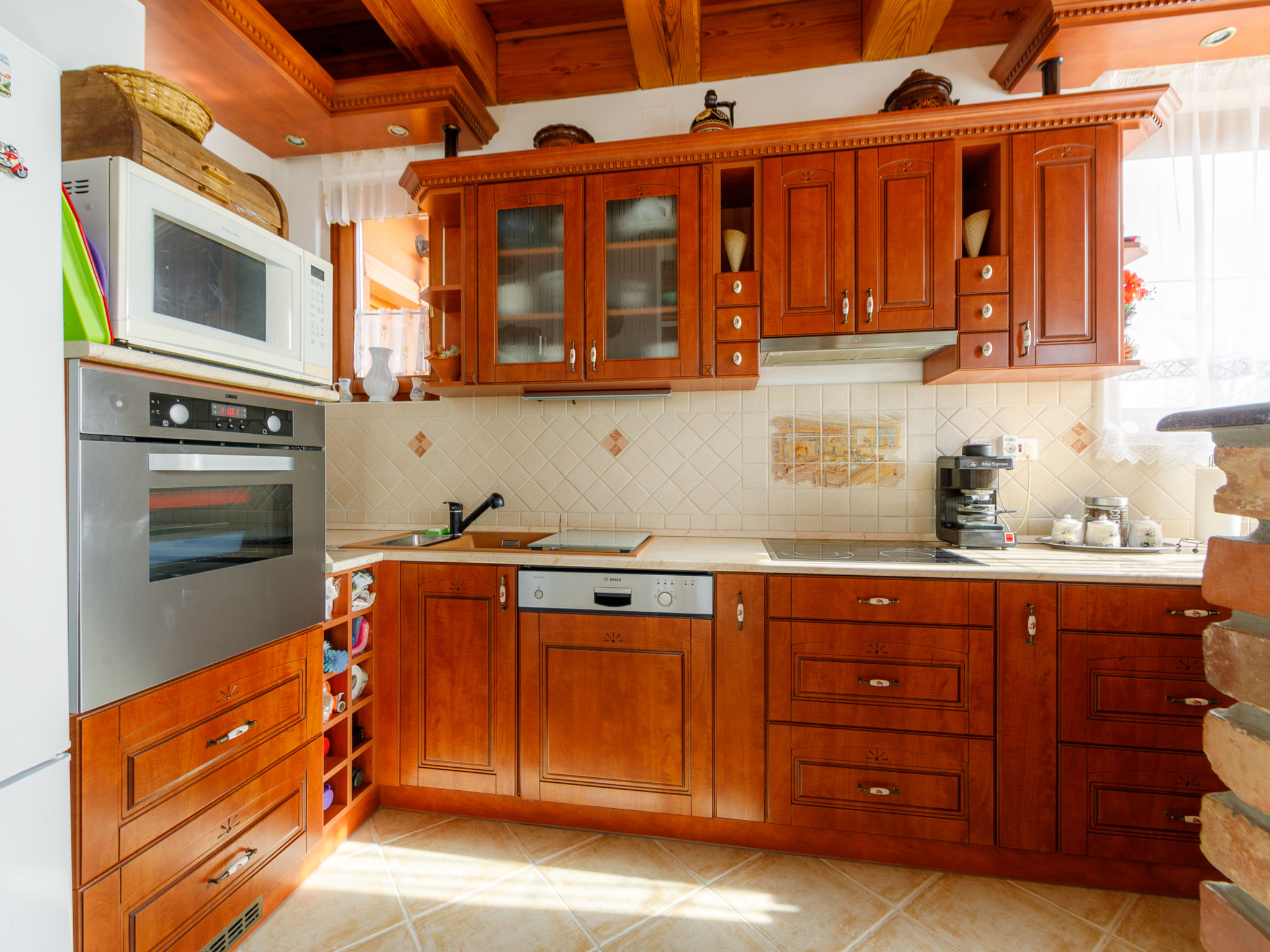 Appartement Kaldi – Cuisine et coin repas, photo 9 sur 28