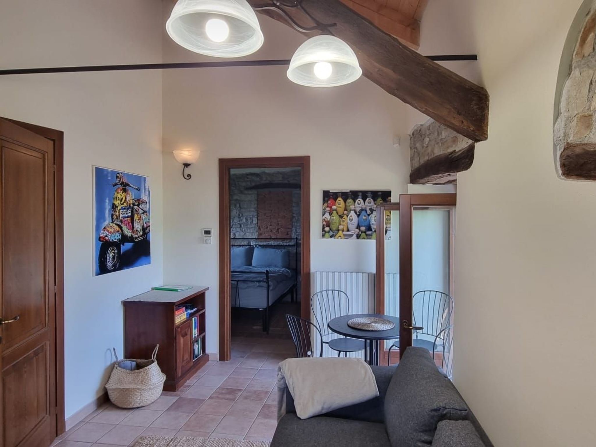 This charming apartment in Olmo Gentile, nestled in the enchanting landscapes of the Alta Langhe Piedmont region, offers a serene getaway for 2-4 guests. Situated in a detached country estate on the f..