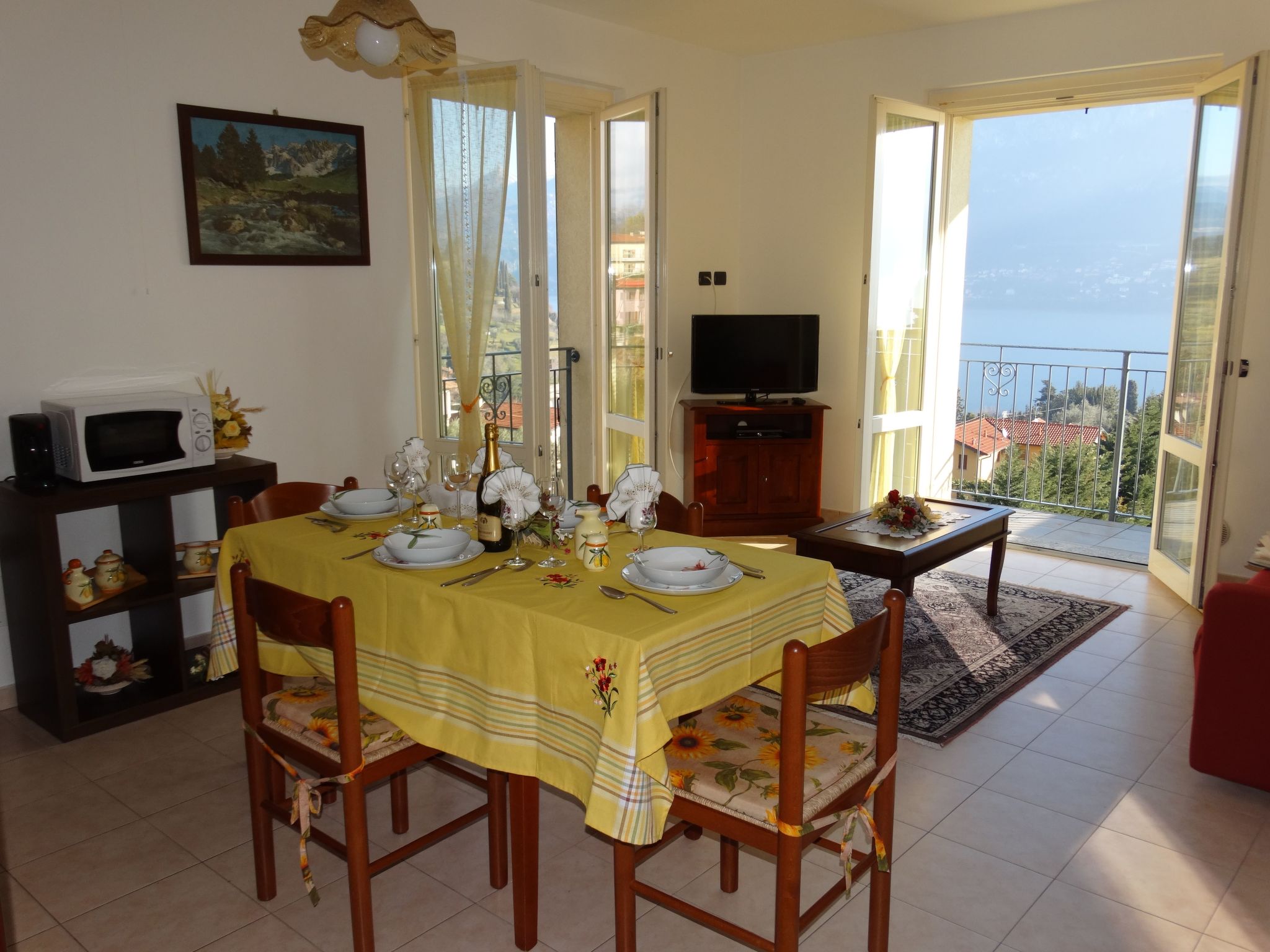 Photo of CasaKatty Zwei-Zimmer-Wohnung mit Balkon mit Seeblick