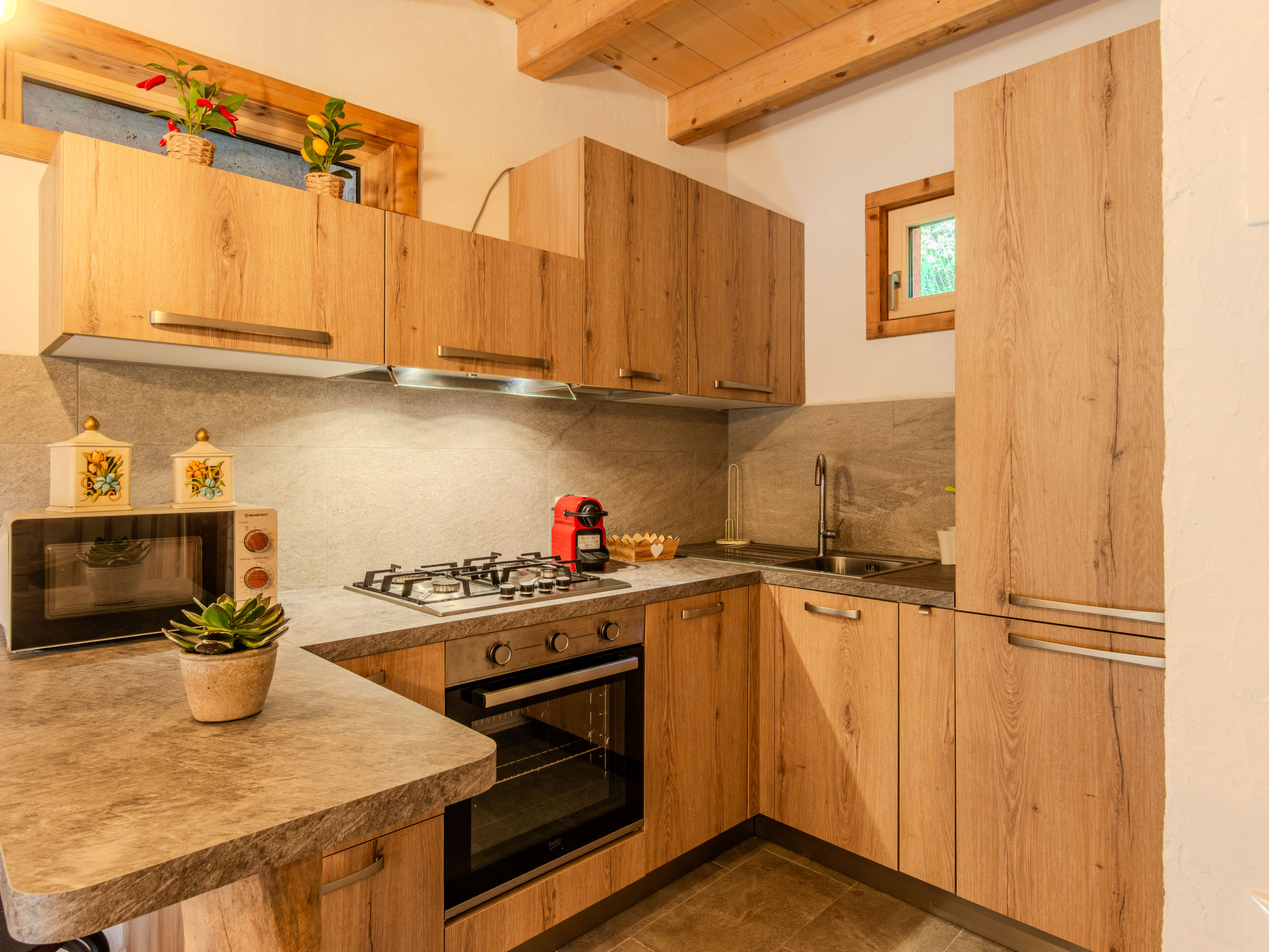 Appartement Olivo – Cuisine et coin repas, photo 8 sur 36