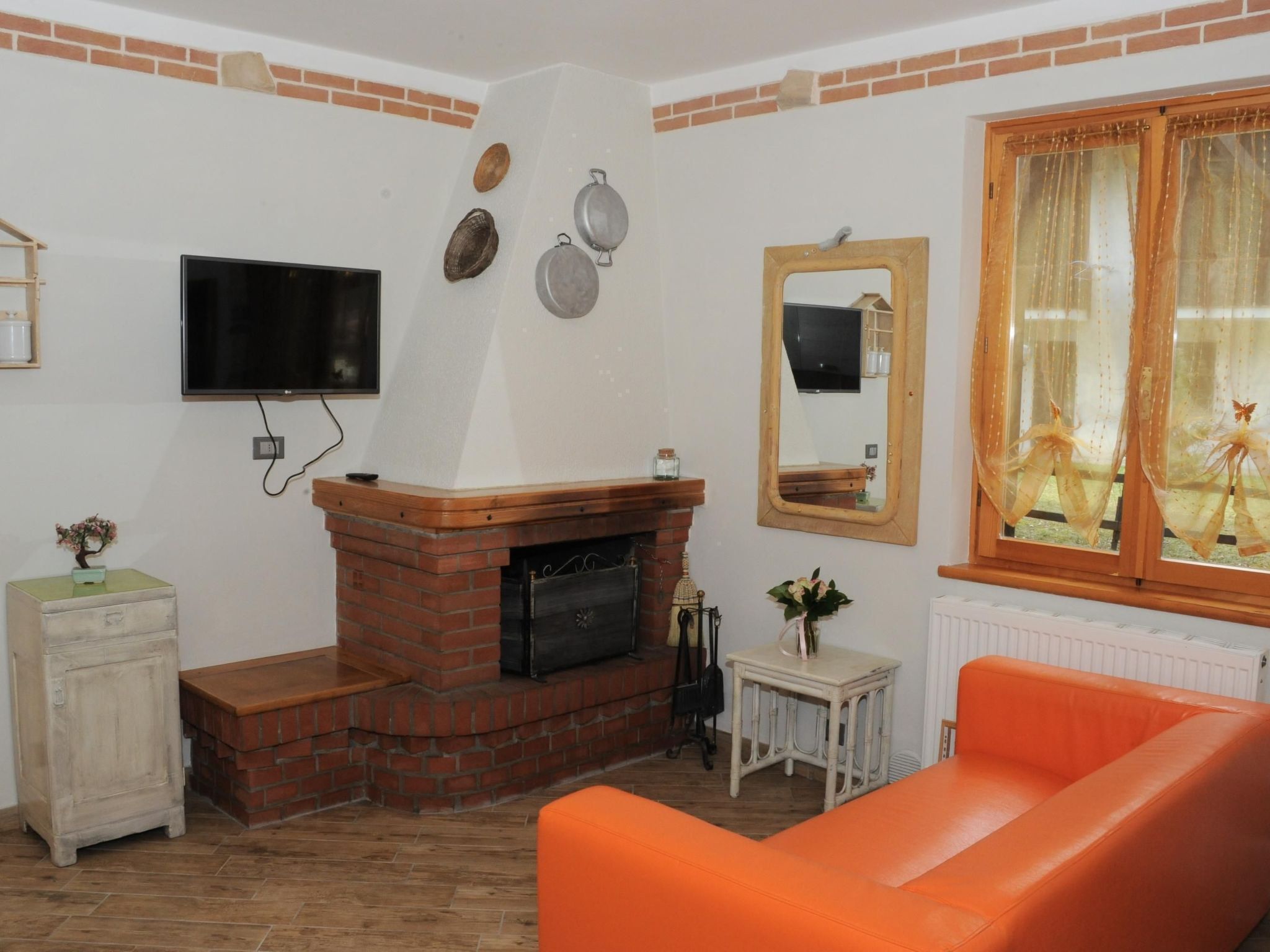 Erdgeschosswohnung mit privatem Garten-Dedans