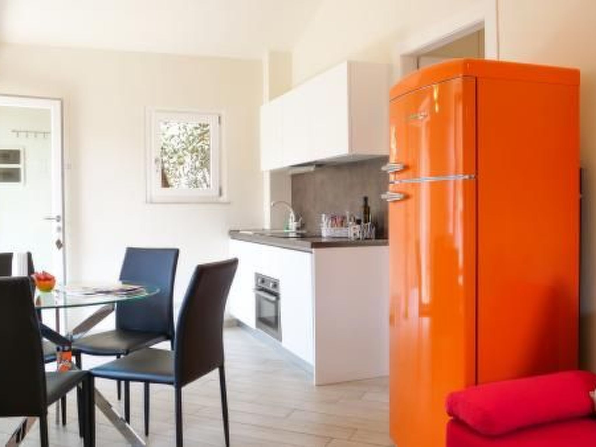 Orange' Wohnung mit privater Terrasse
