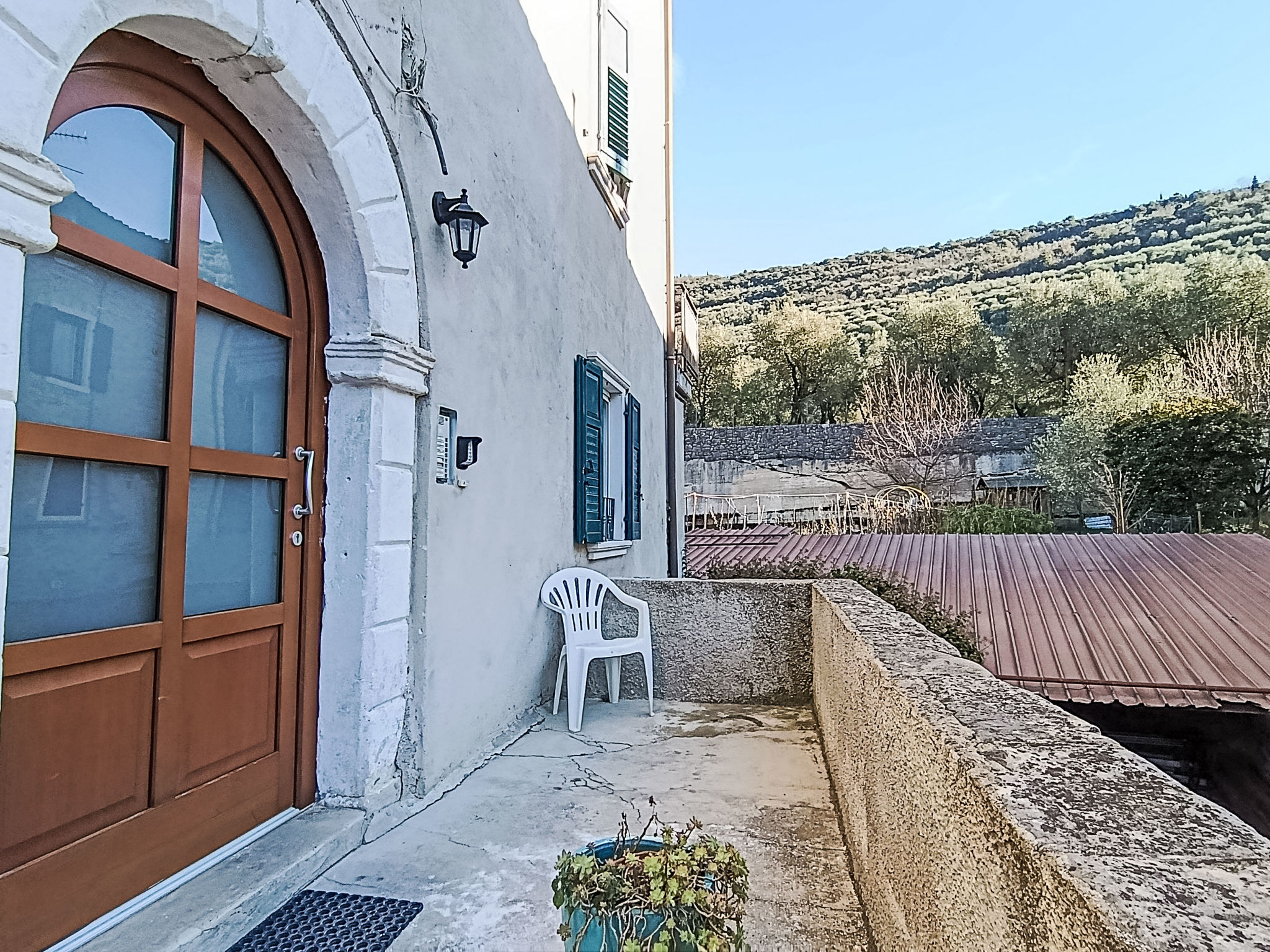 Tra gli Ulivi-Buiten