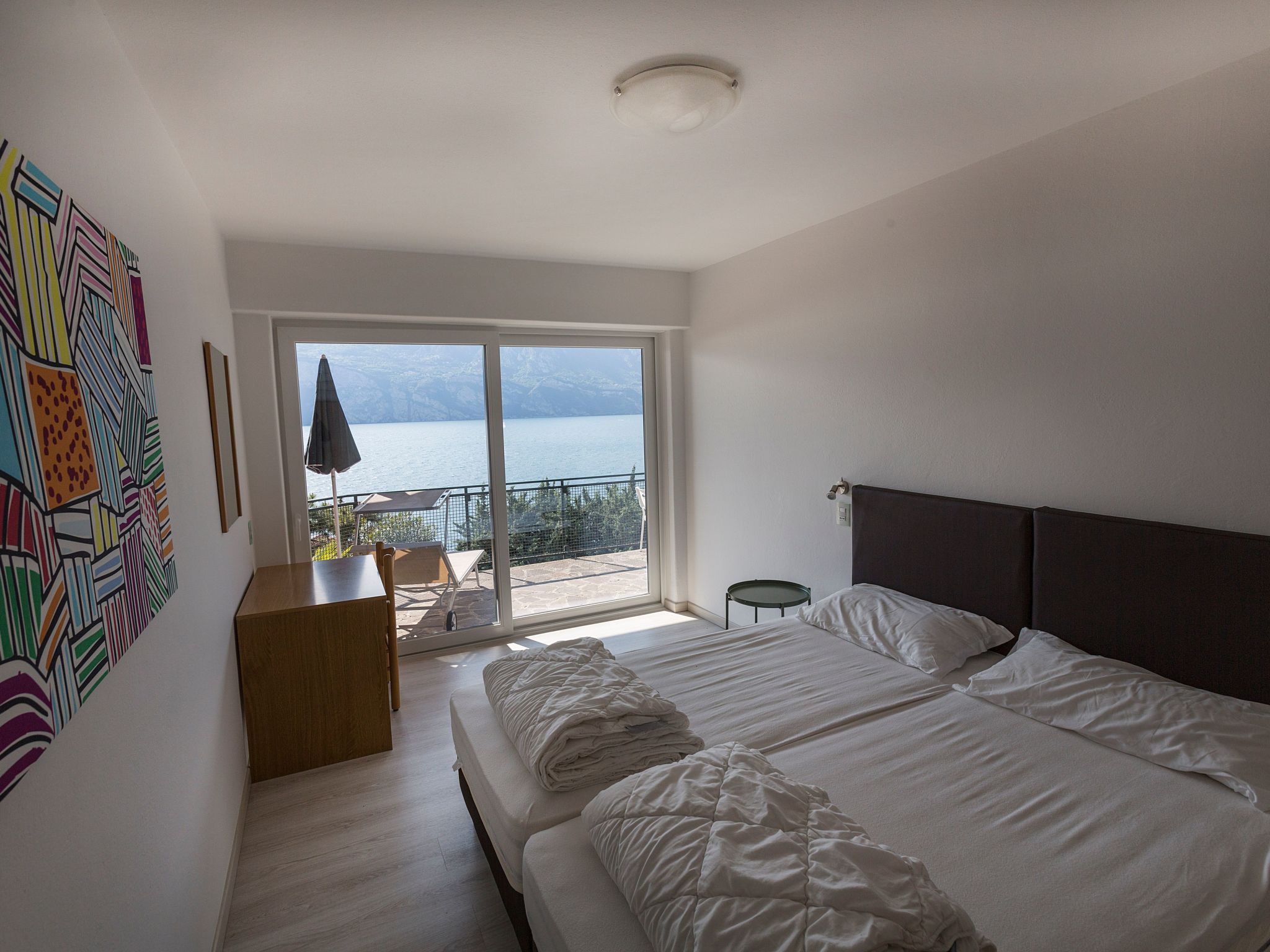 Zwei-Zimmer-Wohnung mit Seeblick, Grill und Gemeinschaftspool-Image-tags.info