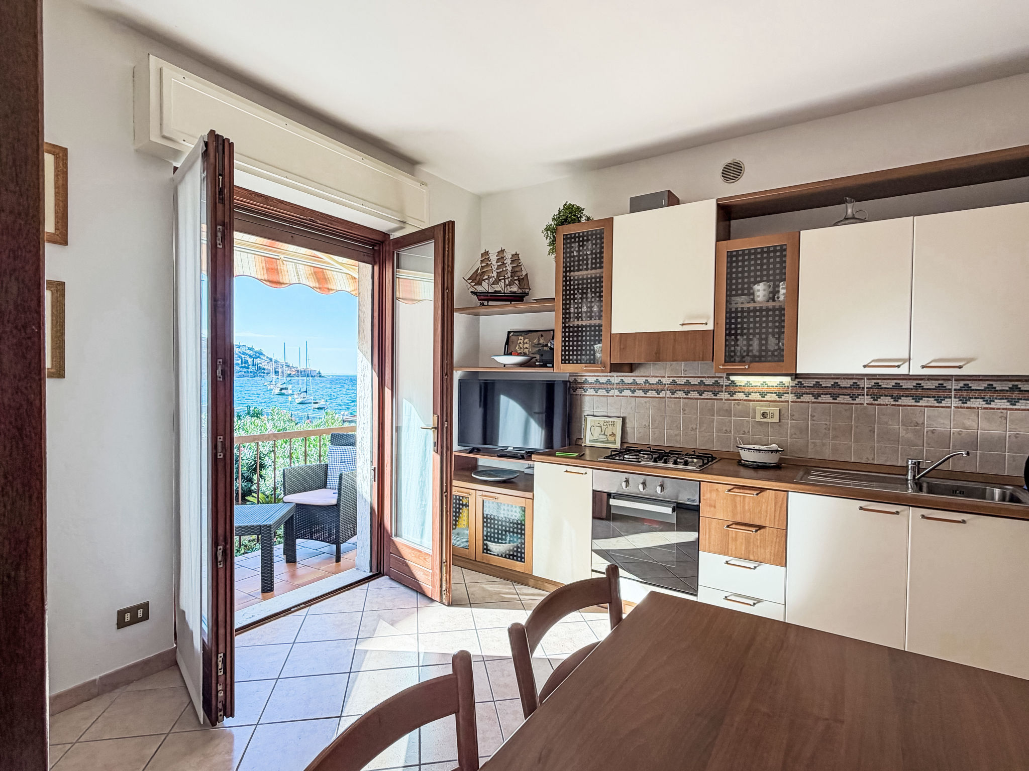 Appartement Lago – Cuisine et coin repas, photo 3 sur 46
