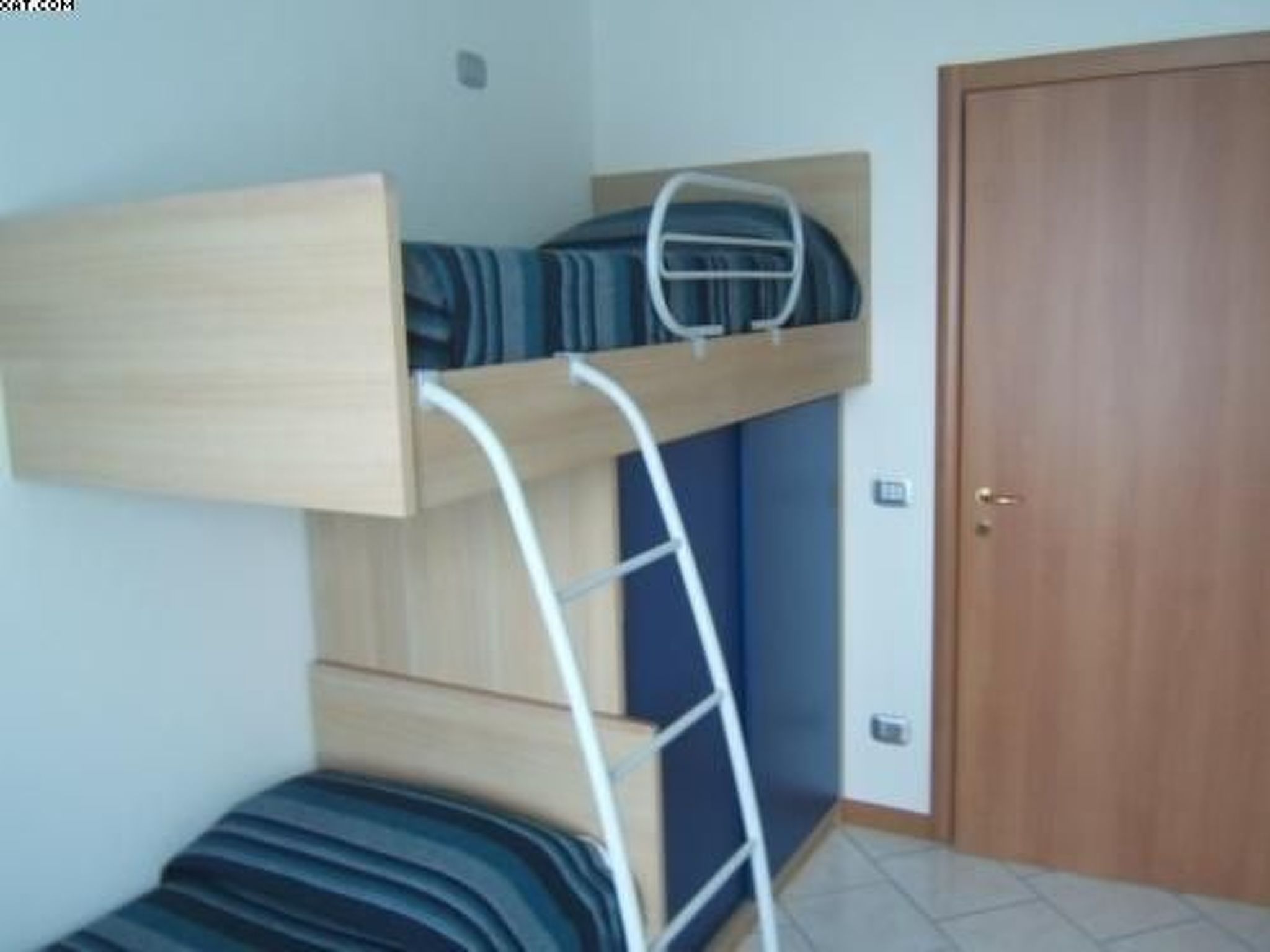 Photo of Wohnung 8 mit Seeblick, Garage, Schwimmbad,