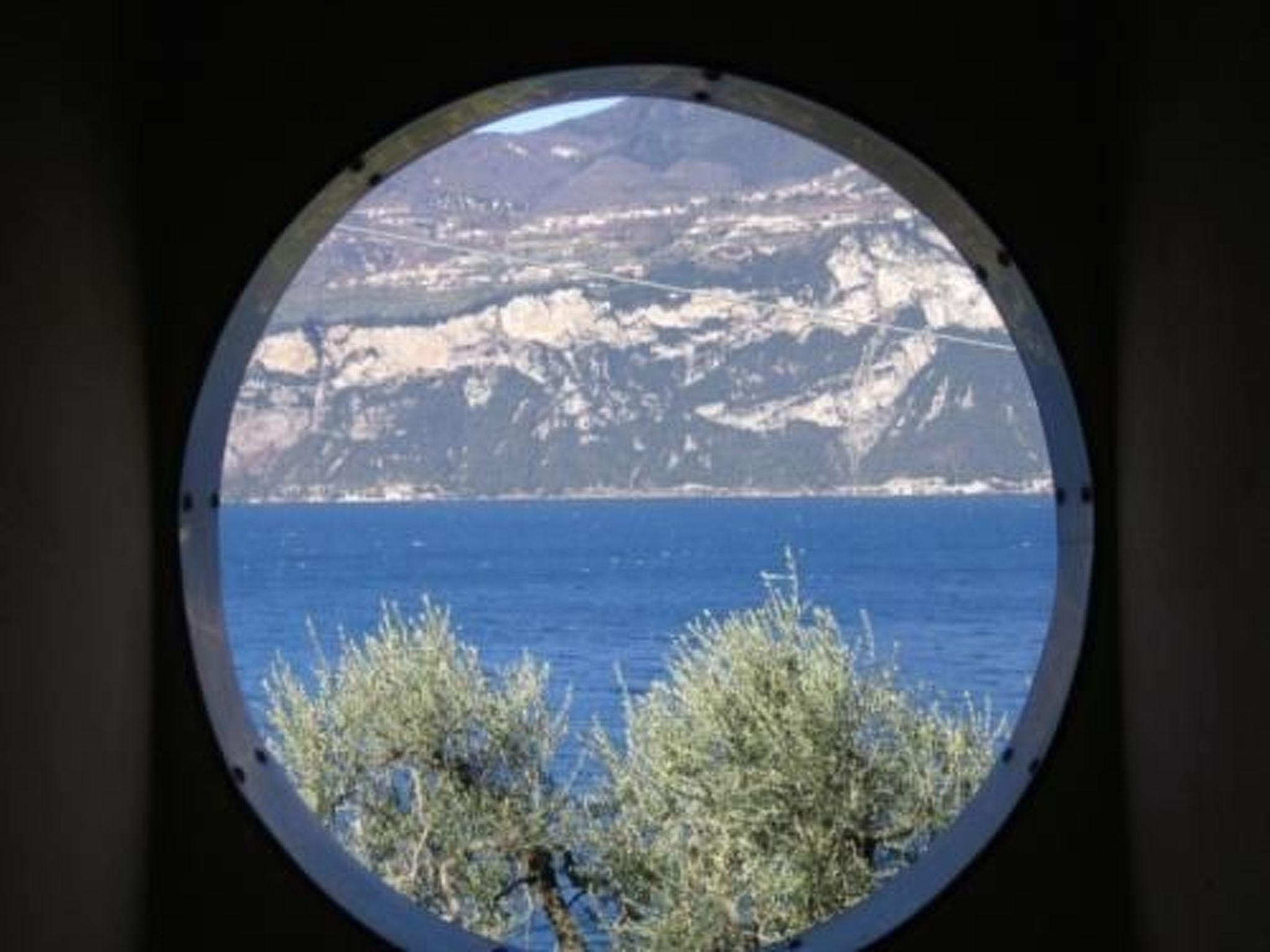 Photo of Wohnung 8 mit Seeblick, Garage, Schwimmbad,