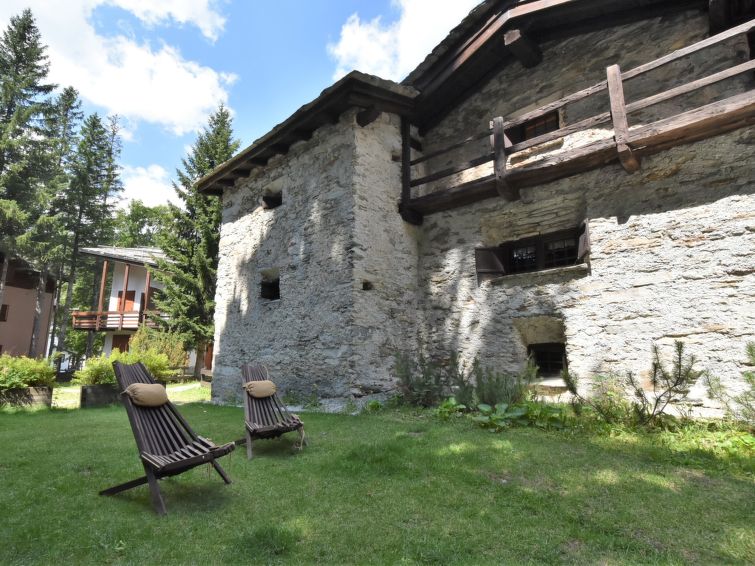 Open haard en luxe in chalet Baita Barin, direct aan de piste in Madesimo