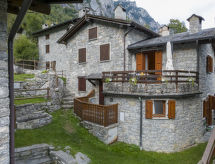 Historisch appartement in het hart van Val di Mello, direct aan de bosrand - thumbnail 1