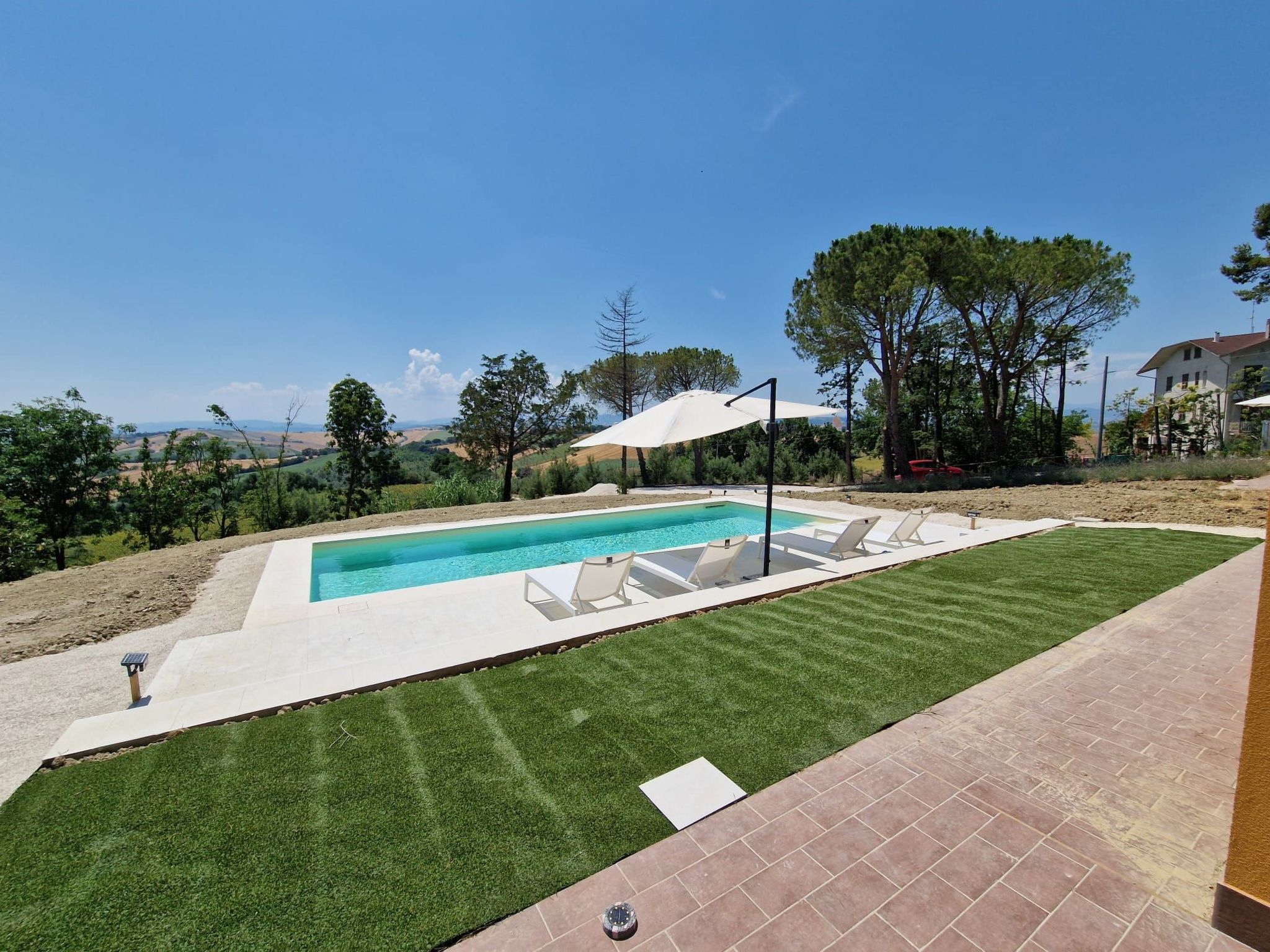 Haus mit Terrasse mit Aussicht und Gemeinschaftspool