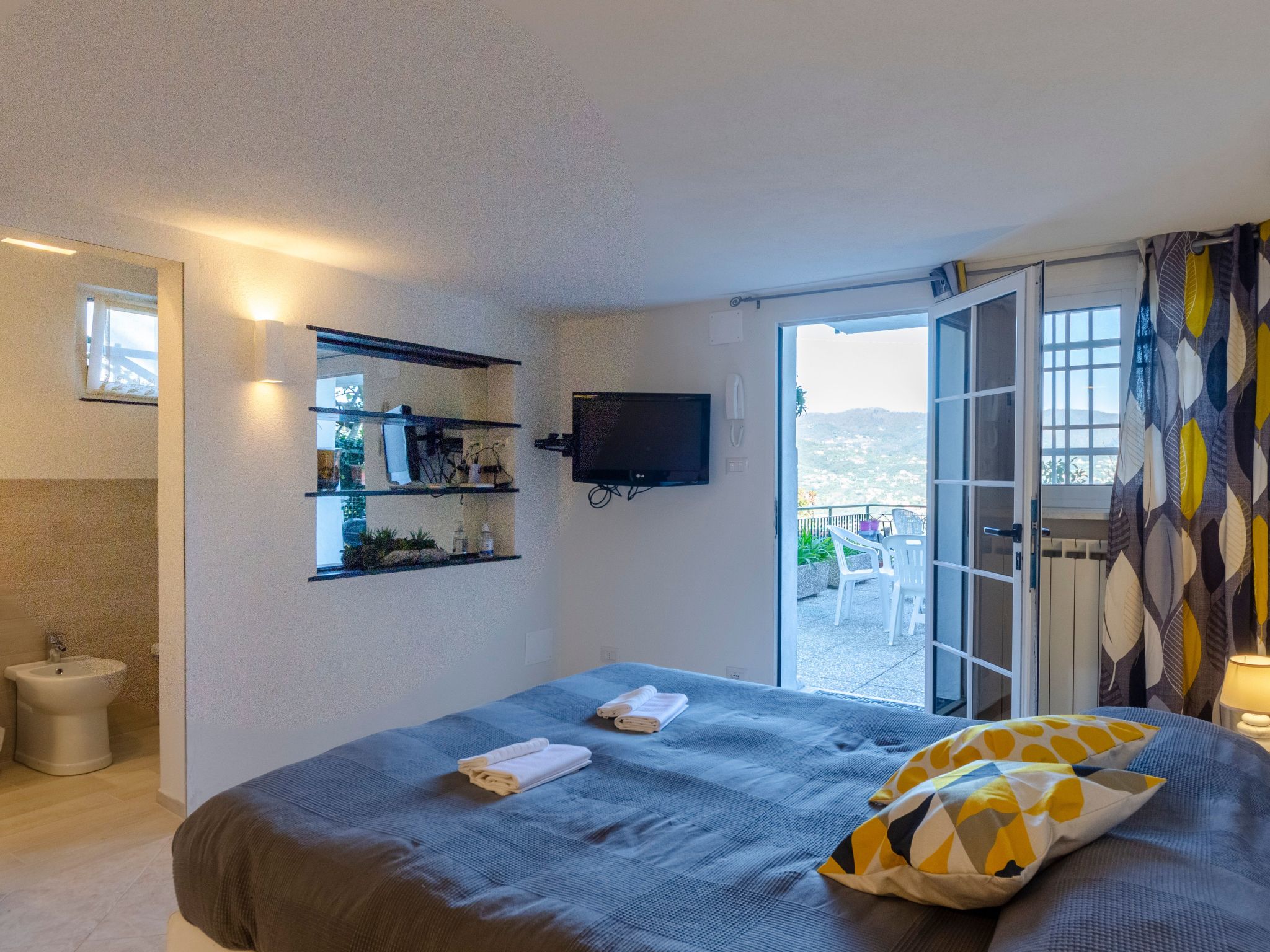 Einzimmerwohnung mit Terrasse und Blick auf den Berg-Image-tags.info