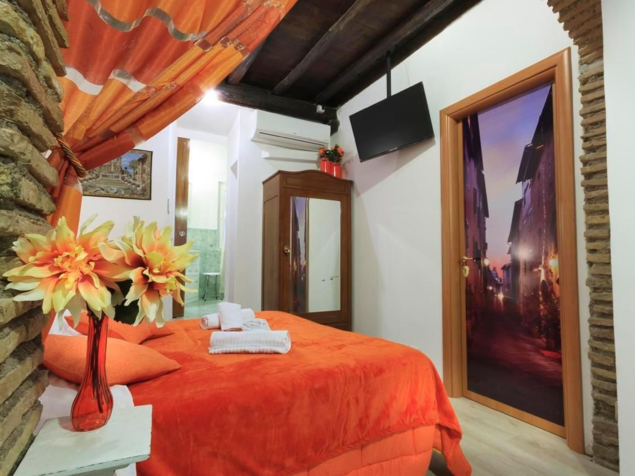 Het RUST studio-appartement heeft een eigen ingang en bevindt zich op de begane grond in hetzelfde gebouw als de B&B "Ventisei Scalini a Trastevere". Het bestaat uit een karakteristieke open ruimte me..