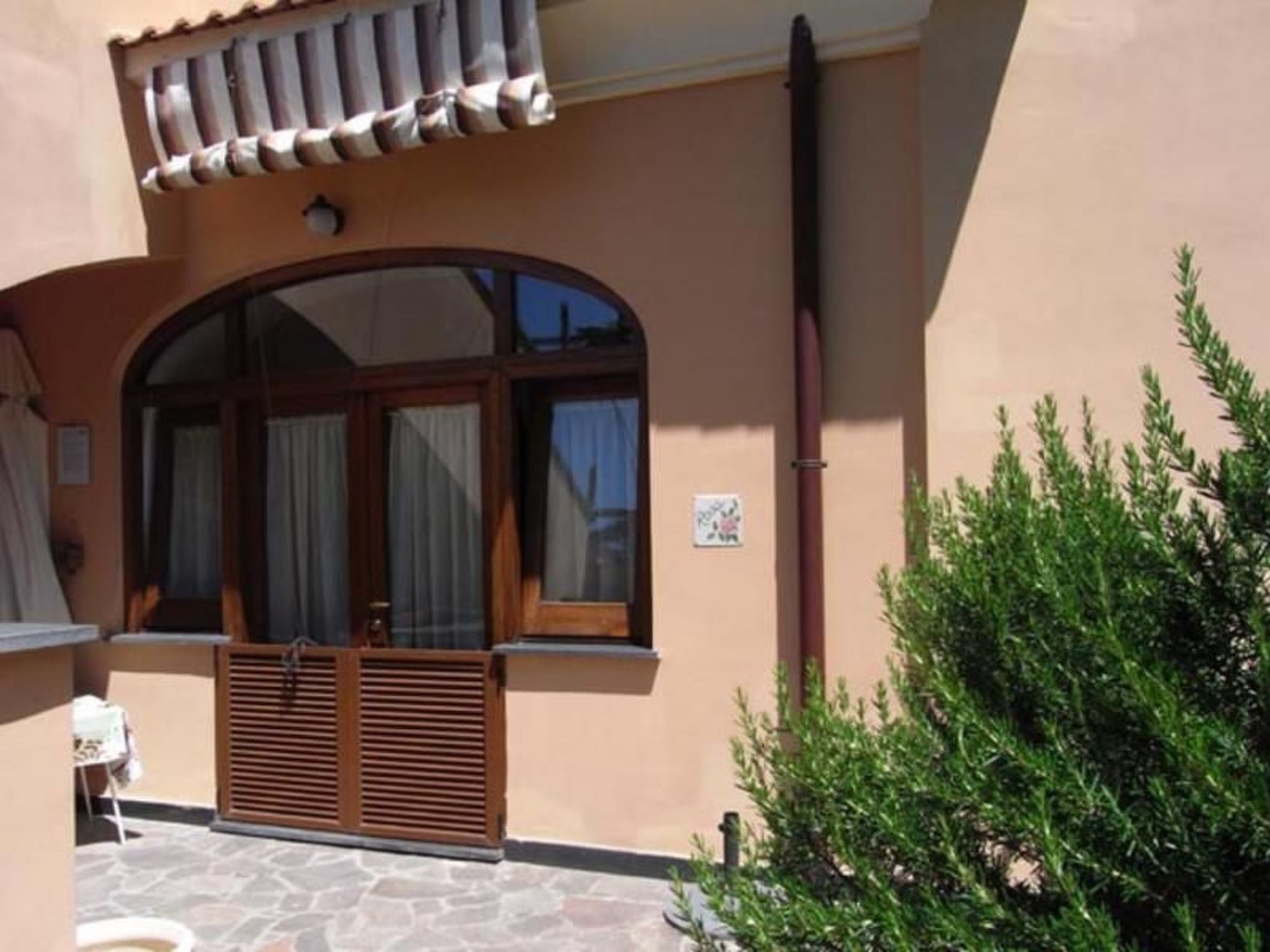 Photo of Rosa' Wohnung mit privatem Garten