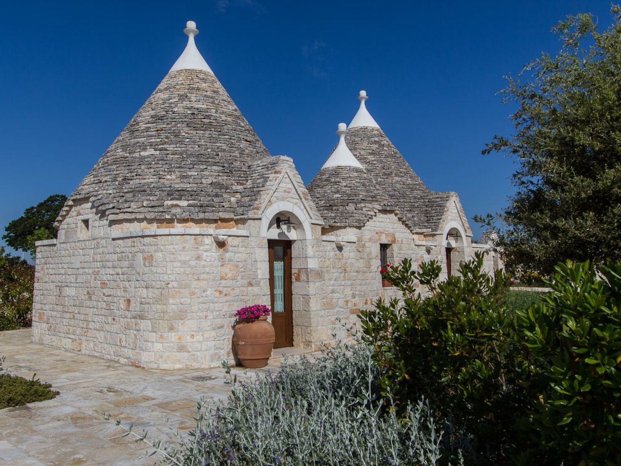 Photo of Große Trullo-Wohnung mit Schwimmbad