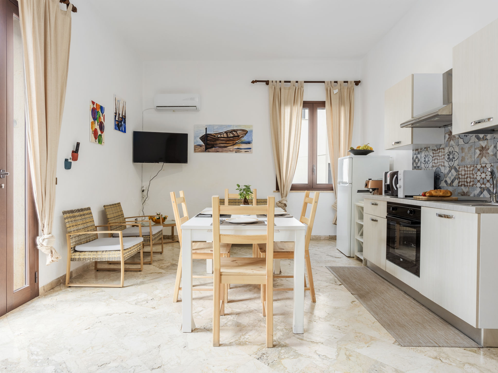 Appartement Savoia – Cuisine et coin repas, photo 8 sur 26