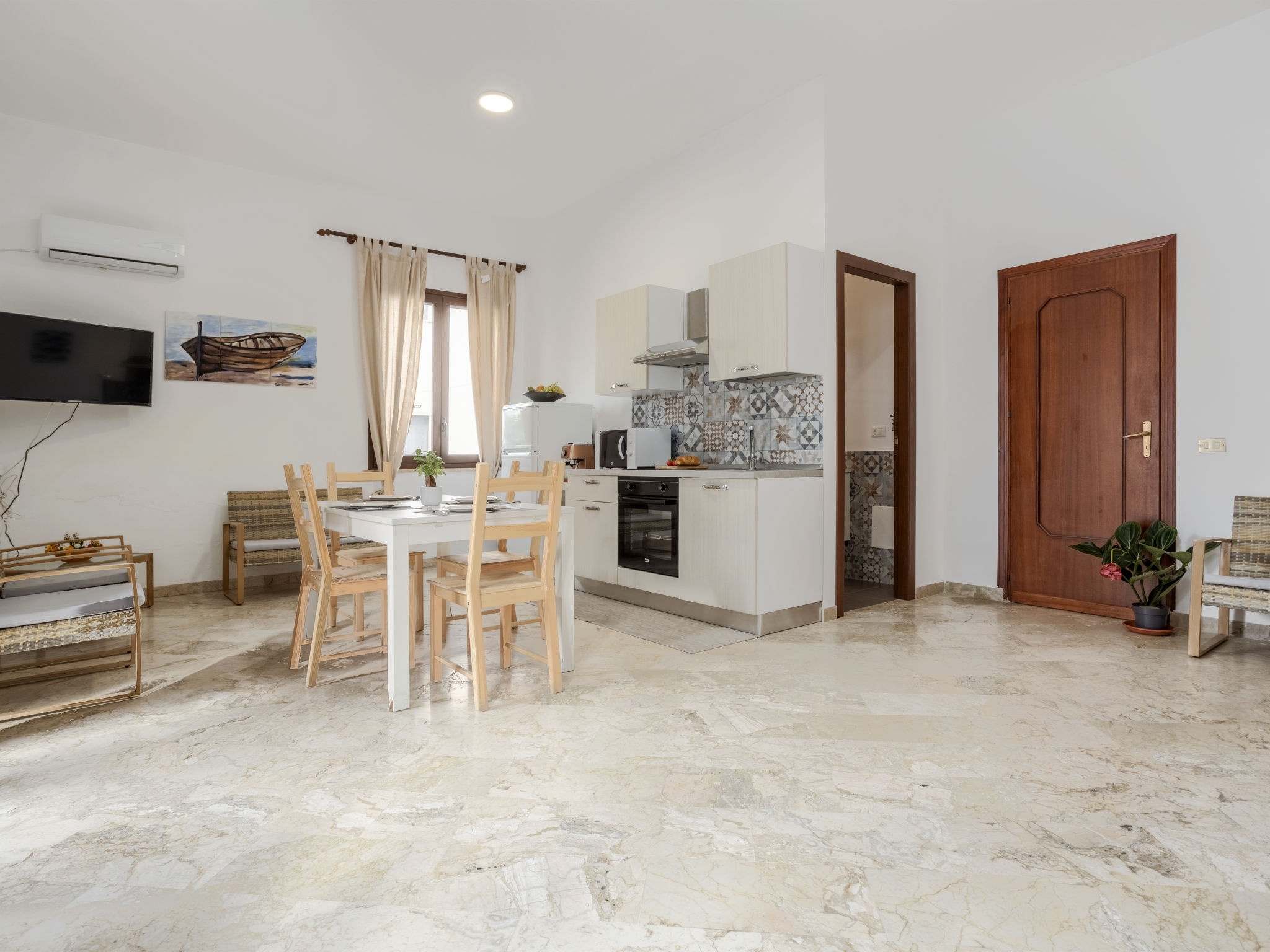Appartement Savoia – Cuisine et coin repas, photo 7 sur 26