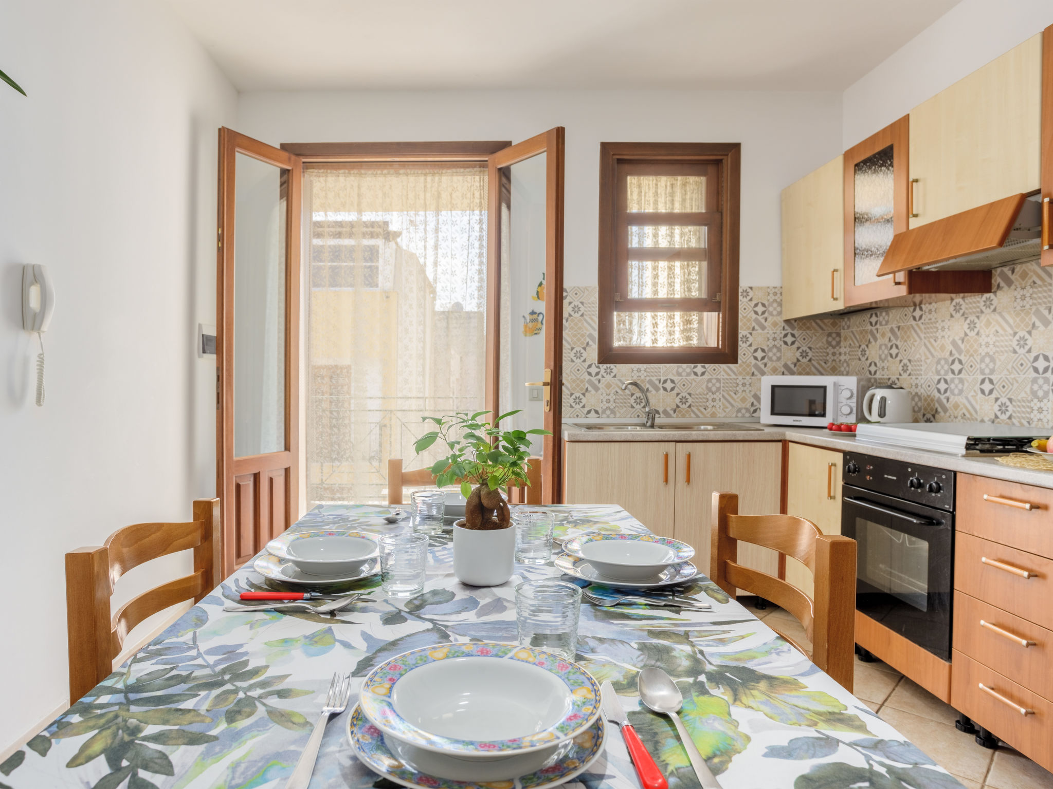 Appartement Giardini Gaia – Cuisine et coin repas, photo 7 sur 34