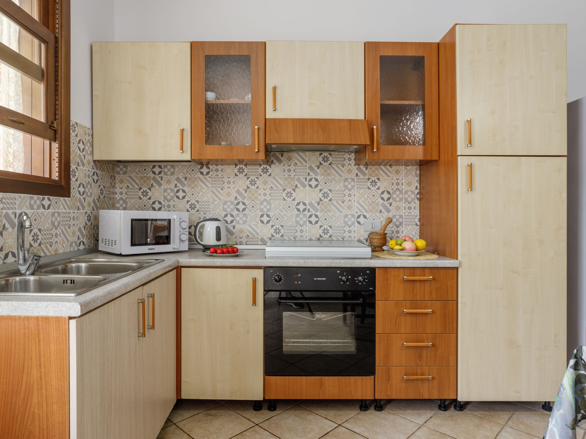 Appartement Giardini Gaia – Cuisine et coin repas, photo 9 sur 34