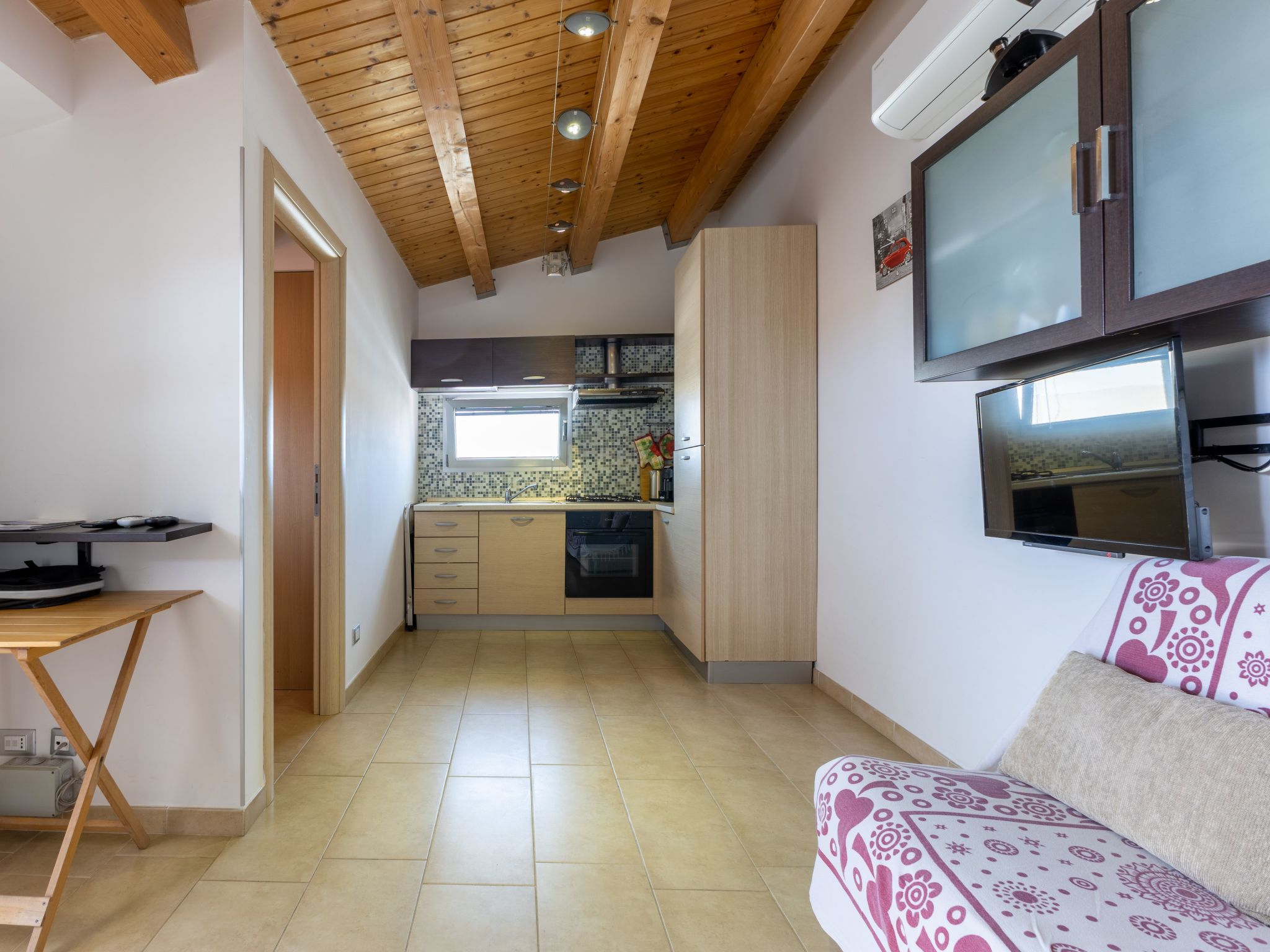 Charmantes Zimmer im Dachgeschoss mit Terrasse mit Meerblick.-Binnen