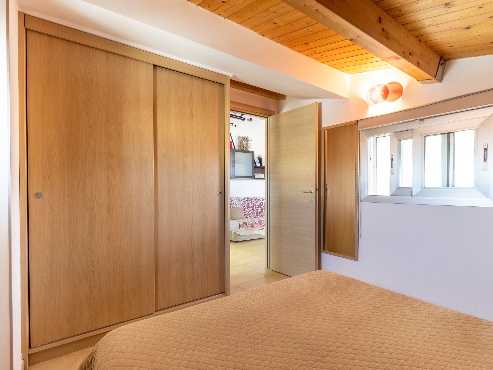 Charmantes Zimmer im Dachgeschoss mit Terrasse mit Meerblick.-Binnen