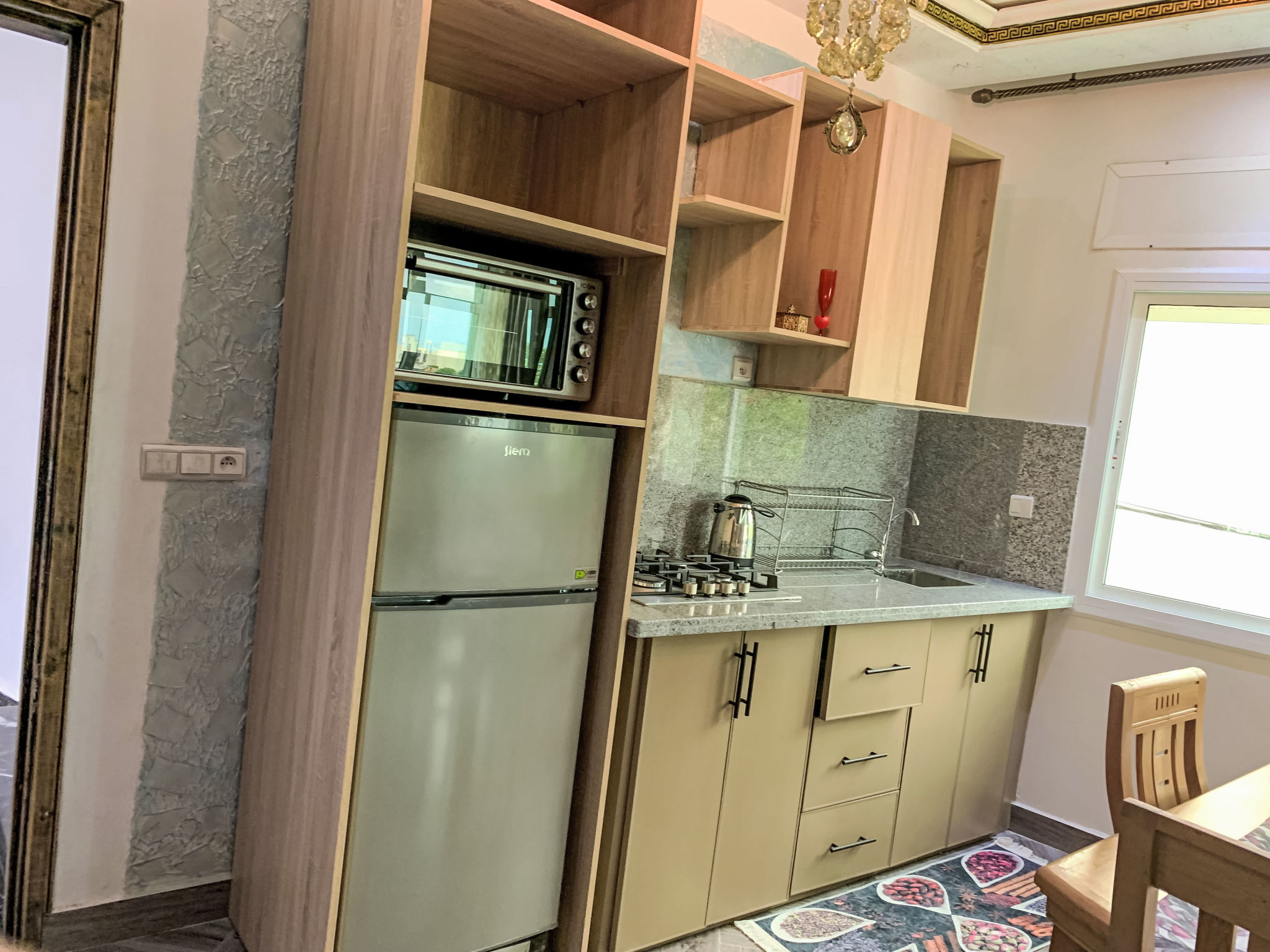 Appartement Jbila Maison – Cuisine et coin repas, photo 13 sur 16