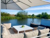 Knusse bungalow aan het meer in Wervershoof met privétuin - thumbnail 1