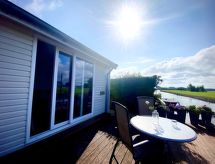 Ela: Gezellige bungalow aan het meer met houten grill en omheinde tuin - thumbnail 1