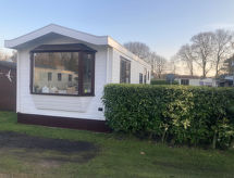 Comfortabel strandhuisje op familievriendelijk park in Kijkduin - thumbnail 1