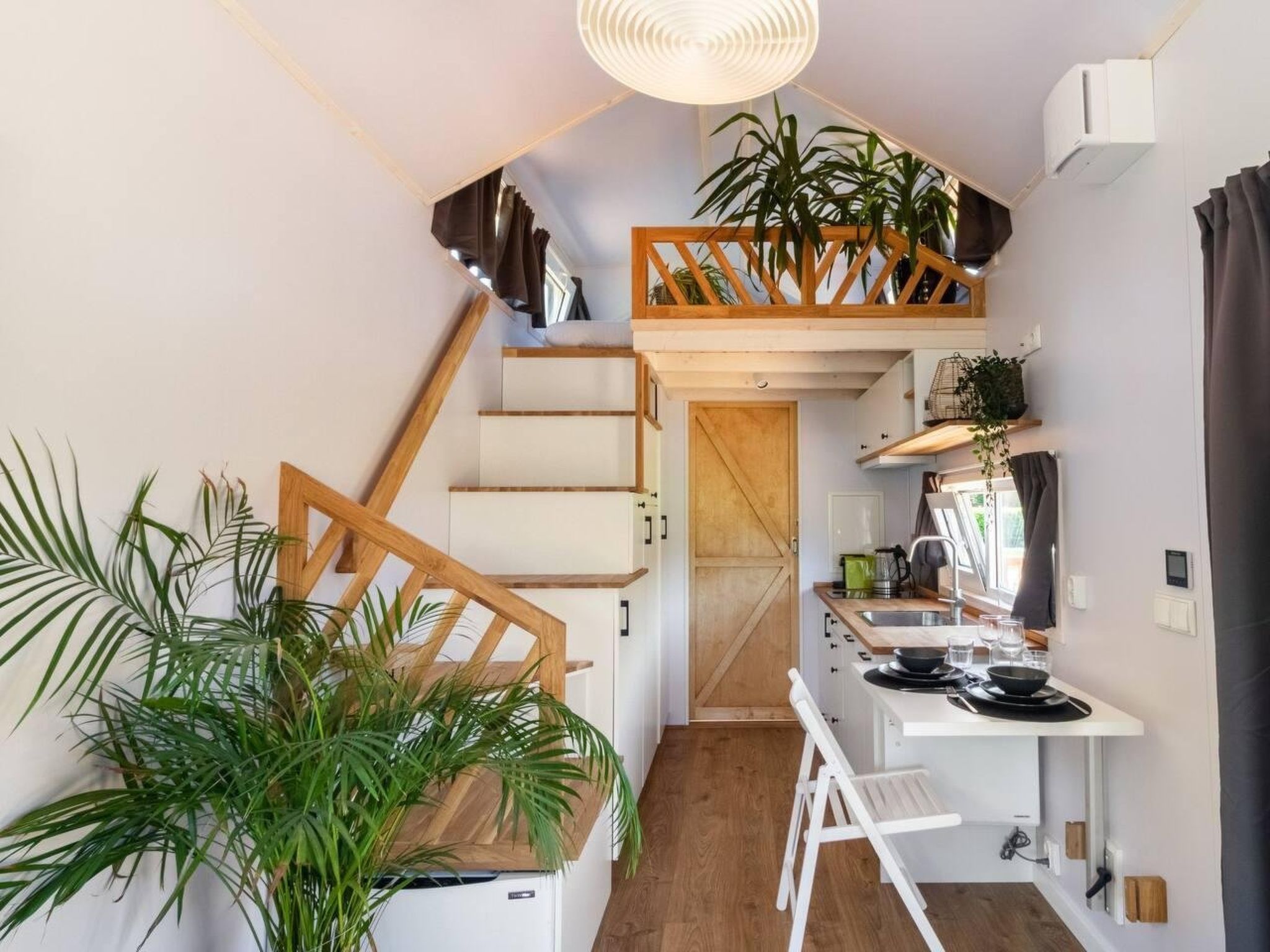De Glamping - Gele Tiny House | 5p - Buiten