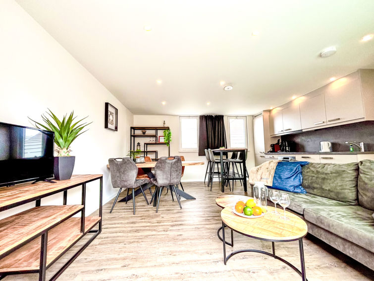 "Beach House Westkapelle 2B", huis 3-kamers. Comfortabel ingericht: woon-/eetkamer met eettafel en Kabel-TV. Uitgang naar het terras. Open keuken (oven, afwasmachine, 4 inductiekookplaten, broodrooste..