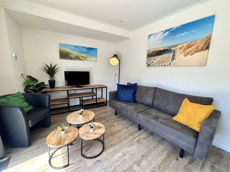 "Beach House Westkapelle 105.1", appartement 3-kamers op de begane grond. Comfortabel ingericht: woon-/eetkamer met eettafel, bar en TV. Uitgang naar het terras. 2 kamers, elke kamer heeft 2 bedden. O..