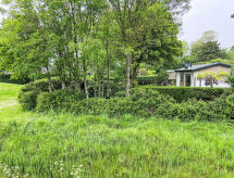 Vrijstaand huisje achter de dijk met tuin, 300m van het strand - thumbnail 2