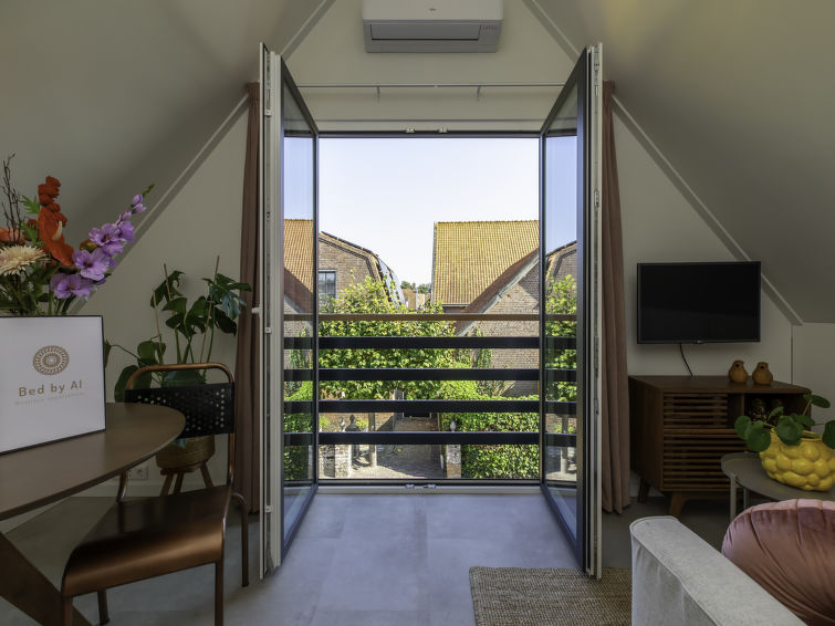 Op 500 m van zee: Modern appartement 'Bed by Al' in Kortgene in Kortgene