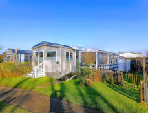 Modern strandappartement met zwembad en golfbaan in Kamperland - thumbnail 1