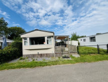 Modern strandappartement aan Zeeuwse golfbaan met zwembad - thumbnail 2