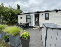 Modern strandappartement bij golfbaan en zee in Nieuwvliet - thumbnail 1