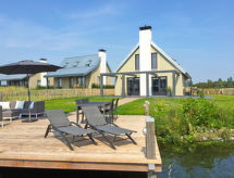 Luxe strandvilla Oesterdam Resort: 10 pers, sauna & jacuzzi aan zee - thumbnail 1