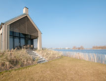 Modern vakantiehuis aan zee op Oesterdam Resort voor 4 personen - thumbnail 1