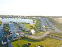 Luxe vrijstaande vakantievilla voor 12 personen direct aan zee op Oesterdam Resort - thumbnail 1