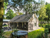 Specht: Luxe 10-persoonsvilla met verwarmd zwembad op kindvriendelijk park in Hoenderloo - thumbnail 1