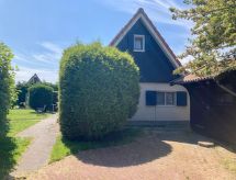 Vrijstaande bungalow Sonnenschein aan meer met golfbaan in Friesland - thumbnail 3