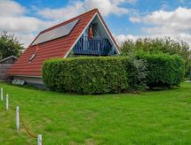 Vrijstaande bungalow Sonnenschein aan meer met golfbaan in Friesland - thumbnail 4