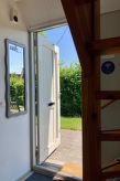 Vrijstaande bungalow Sonnenschein aan meer met golfbaan in Friesland - thumbnail 5