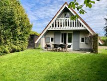 Vrijstaande bungalow aan het Lauwersmeer met tuin en overdekt terras - thumbnail 1