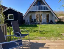 Vakantiehuis aan Lauwersmeer met golfbaan, honden welkom - thumbnail 1
