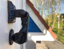 Grachthaus: Vrijstaande bungalow aan het Lauwersmeer met tuin en golfbaan - thumbnail 3